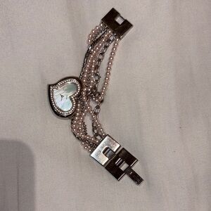 Guess heart and pearl bracelet watch.